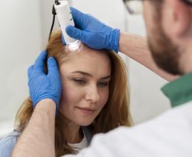 woman-getting-hair-loss-treatment-clinic